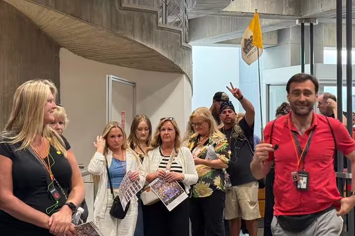 Expert guide leading small group inside Vatican Museums, skip-the-line tour to the Sistine Chapel in Rome