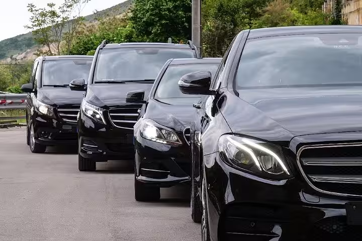 Fleet of sleek black Mercedes vehicles for private transfers from Venice to Ravenna Porto Corsini Cruise Terminal.