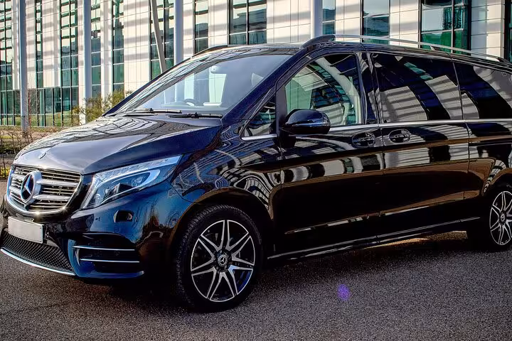 Luxurious black Mercedes van ready for private transfers to Ravenna Porto Corsini Cruise Terminal from Venice.