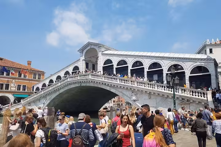 Venice Rialto Bridge over the Grand Canal, highlight of 10-day private Italy tour from Rome to Venice