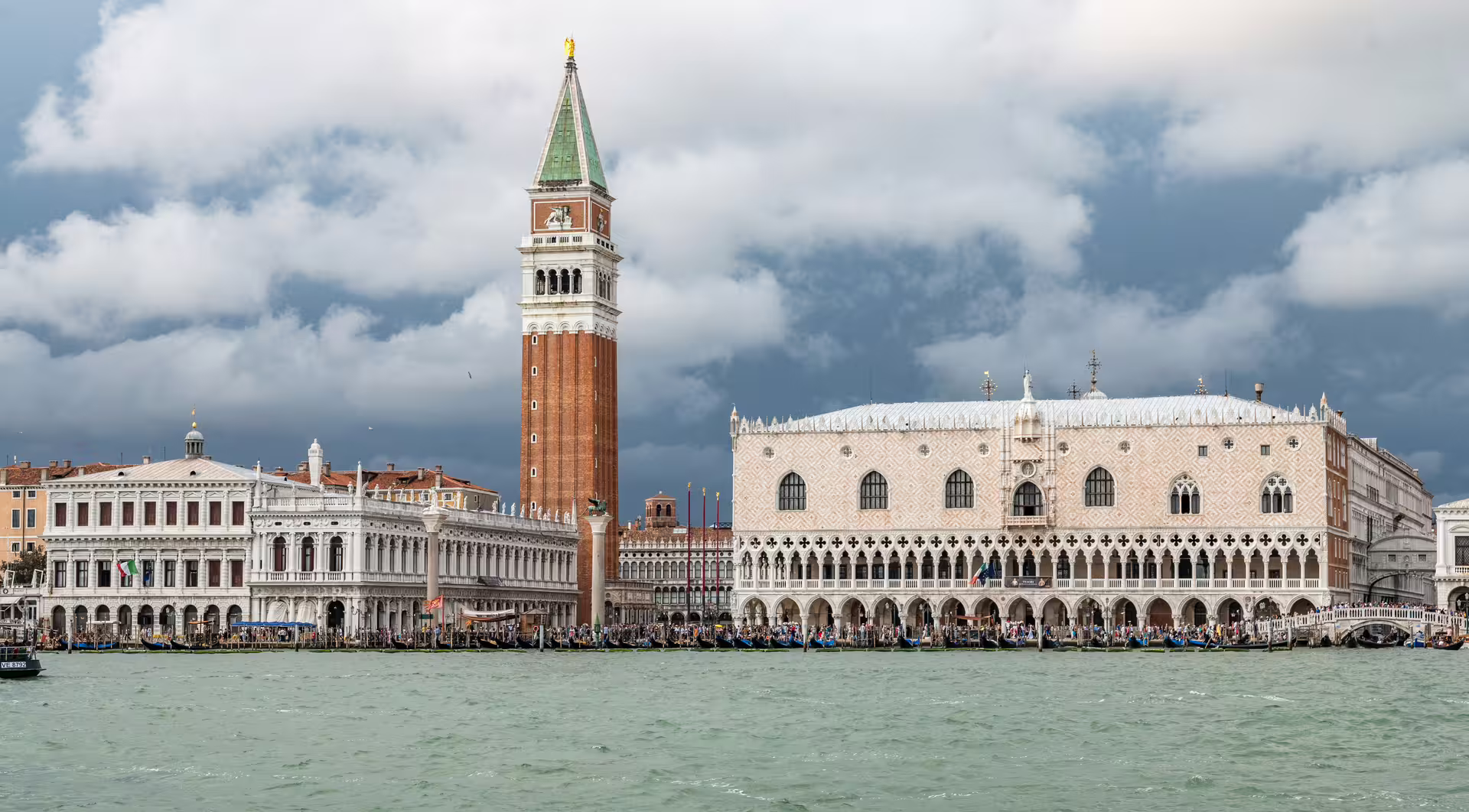 St. Mark's Campanile and Doge's Palace along the Venetian waterfront, a must-see on the city tour.