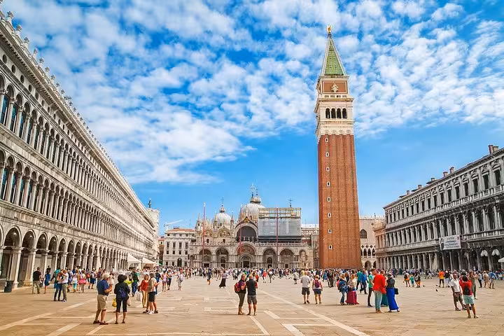 Stroll through Venice's vibrant St. Mark's Square, a highlight of the Venice Express Walking Tour.