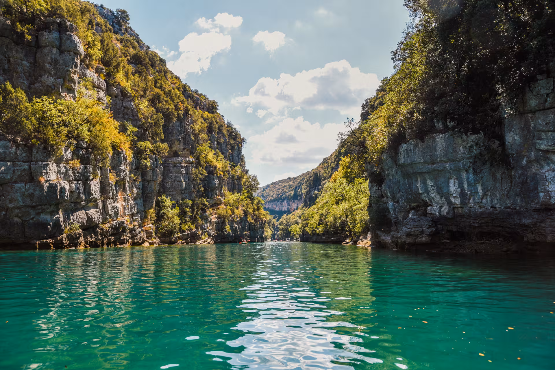Scenic Verdon River canyon cruise view in Gorges du Verdon, emerald water and cliffs on 6D/5N hotel tour