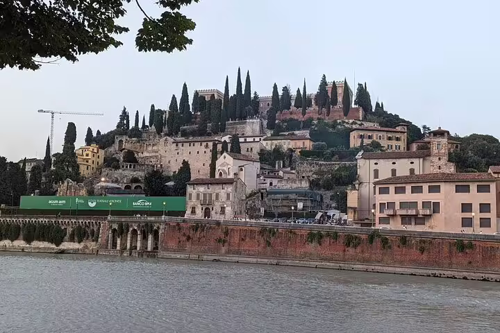 Verona riverside view of Castel San Pietro hill above the Adige, scenic highlight on a guided walking tour