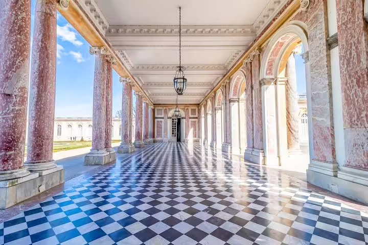 Marble colonnade corridor at Versailles Palace, private guided day tour from Paris with expert guide