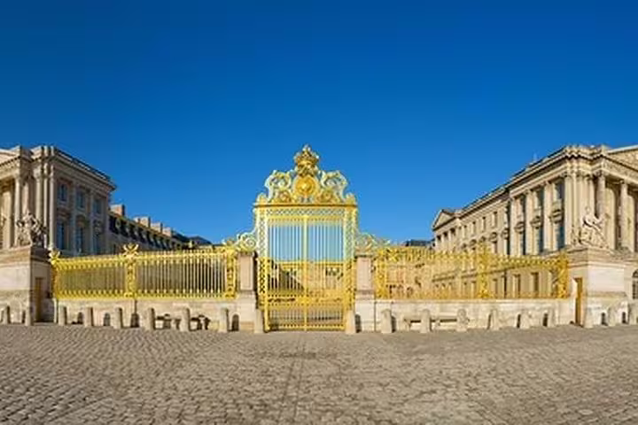 Golden Gate entrance at Palace of Versailles on guided tour with skip-the-line tickets, Paris day trip