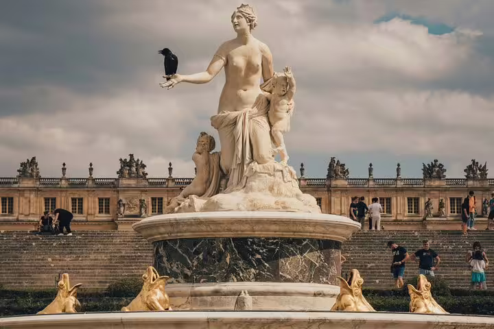 Discover the intricate details of Versailles' statues and fountains on an enlightening guided tour from Paris.