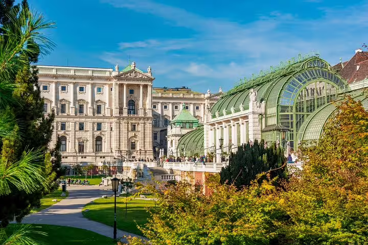 Stunning view of Vienna's architectural landmarks and lush gardens, ideal for a private family tour exploring city highlights.
