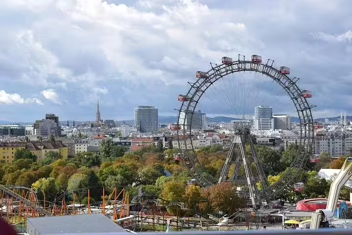 Panoramic view of Vienna with the iconic Giant Ferris Wheel at Prater, perfect for a private half-day sightseeing tour.