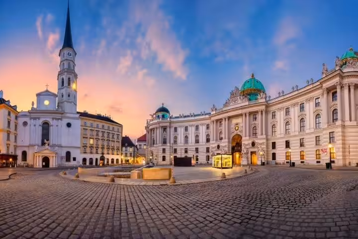 Vienna Hofburg Palace and Michaelerplatz at dusk, scenic stop on Budapest to Vienna day trip via Bratislava