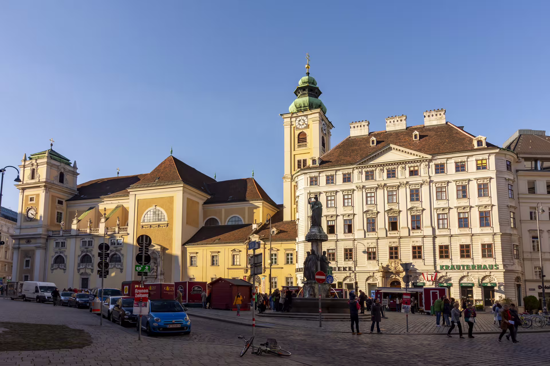 Vienna Michaelerplatz with baroque facades and clock tower on Emperor Route 1-day walking tour audioguide