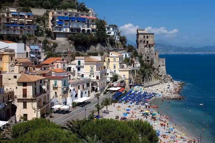 Charming seaside village of Vietri sul Mare with vibrant umbrellas and historic architecture on the Amalfi Coast.