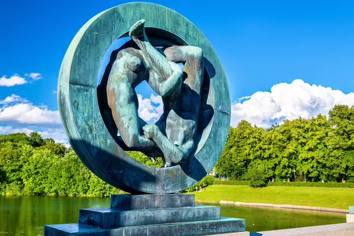 Bronze circular sculpture with intertwined human figures at Vigeland Park, Oslo, Norway