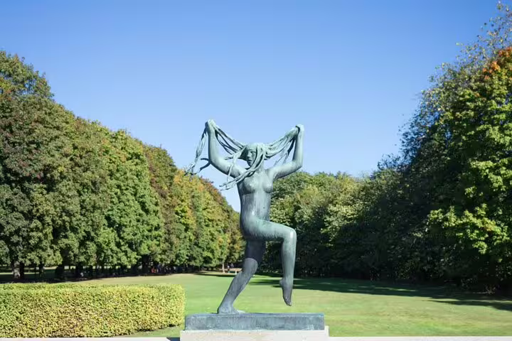 Bronze nude female statue with flowing hair at Vigeland Park Oslo on a sunny day