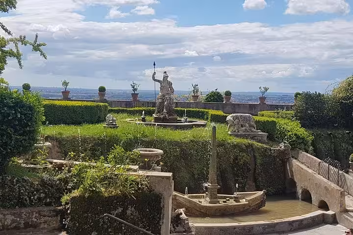 Villa d’Este Tivoli Neptune fountain terrace gardens with statues and panoramic views on full-day trip from Rome