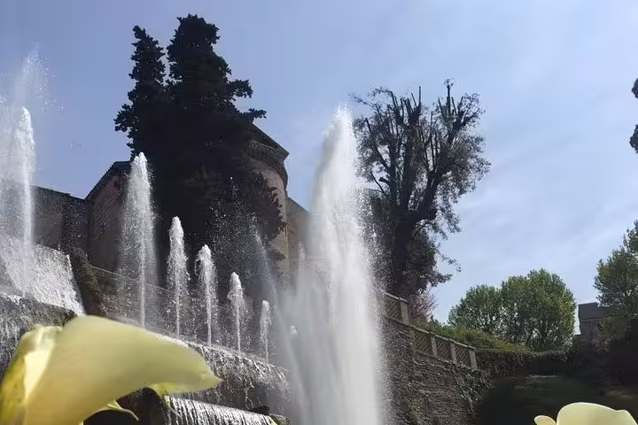 Tall water jets at Villa d’Este fountains in Tivoli, scenic half-day tour from Rome Italy