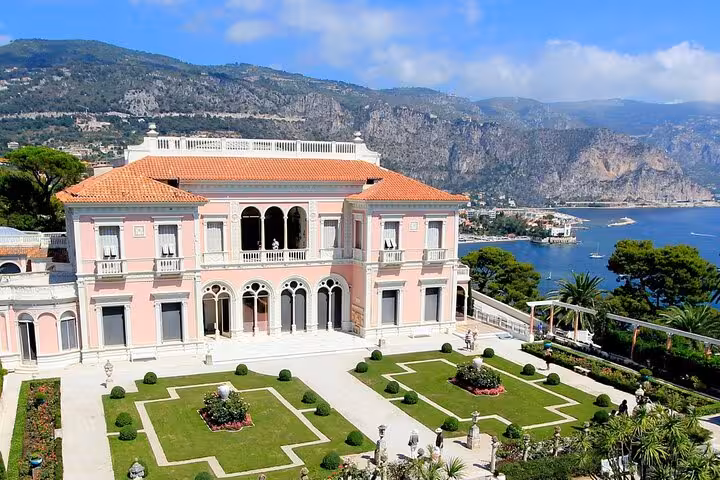 Pink Villa Ephrussi de Rothschild with manicured gardens and Mediterranean sea views at Cap Ferrat