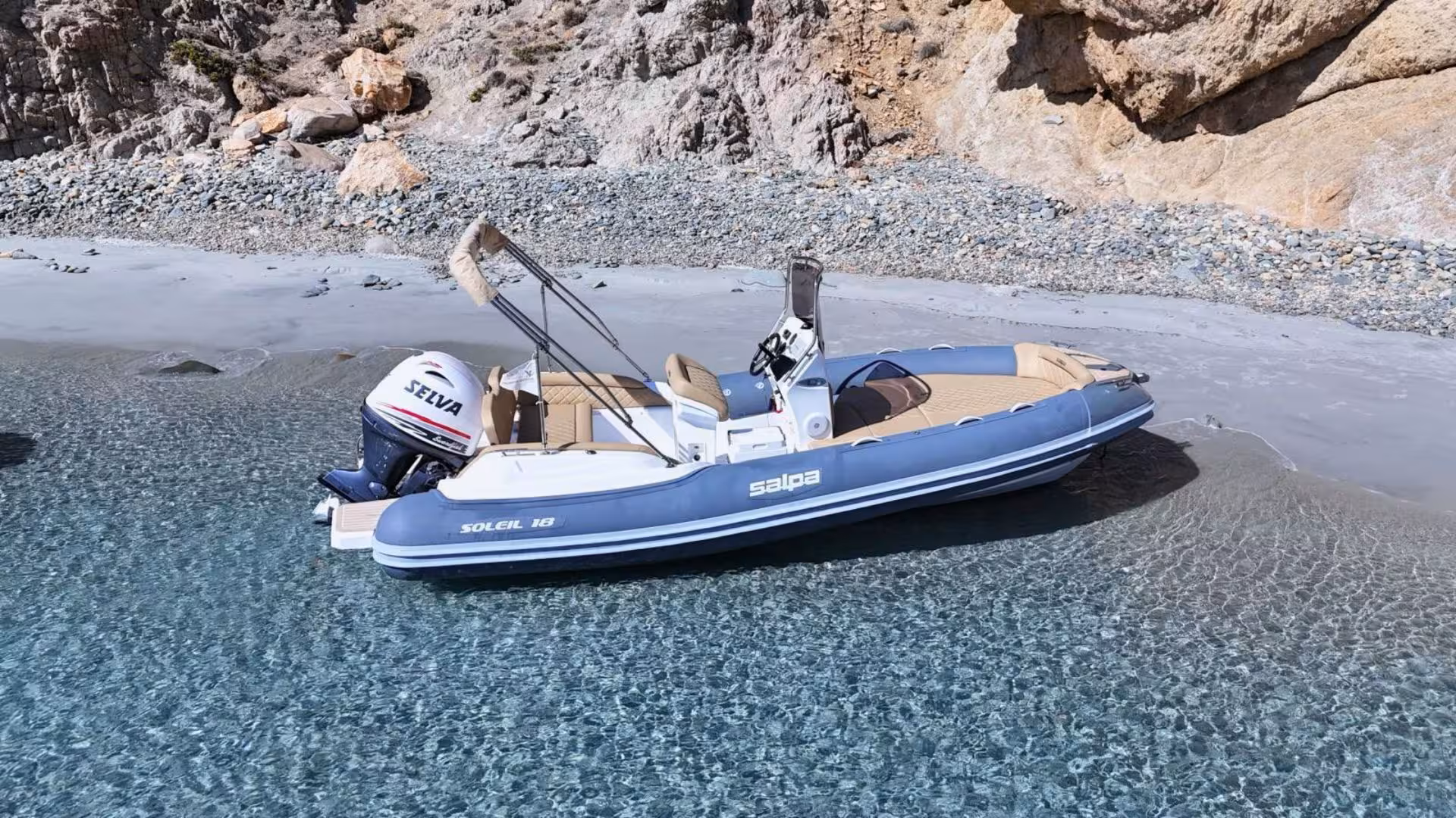 Private dinghy on pristine Villasimius beach, perfect for 4-hour coastal tour with clear blue waters and scenic cliffs.