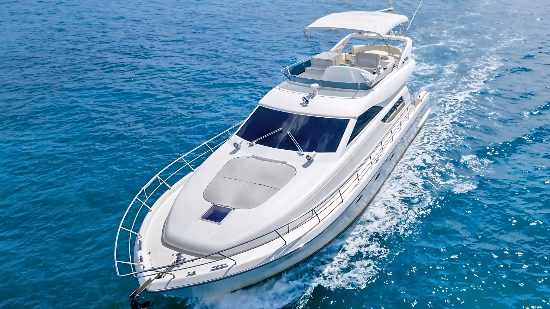 Elegant yacht sailing smoothly across the turquoise sea on a private Villasimius yacht tour.