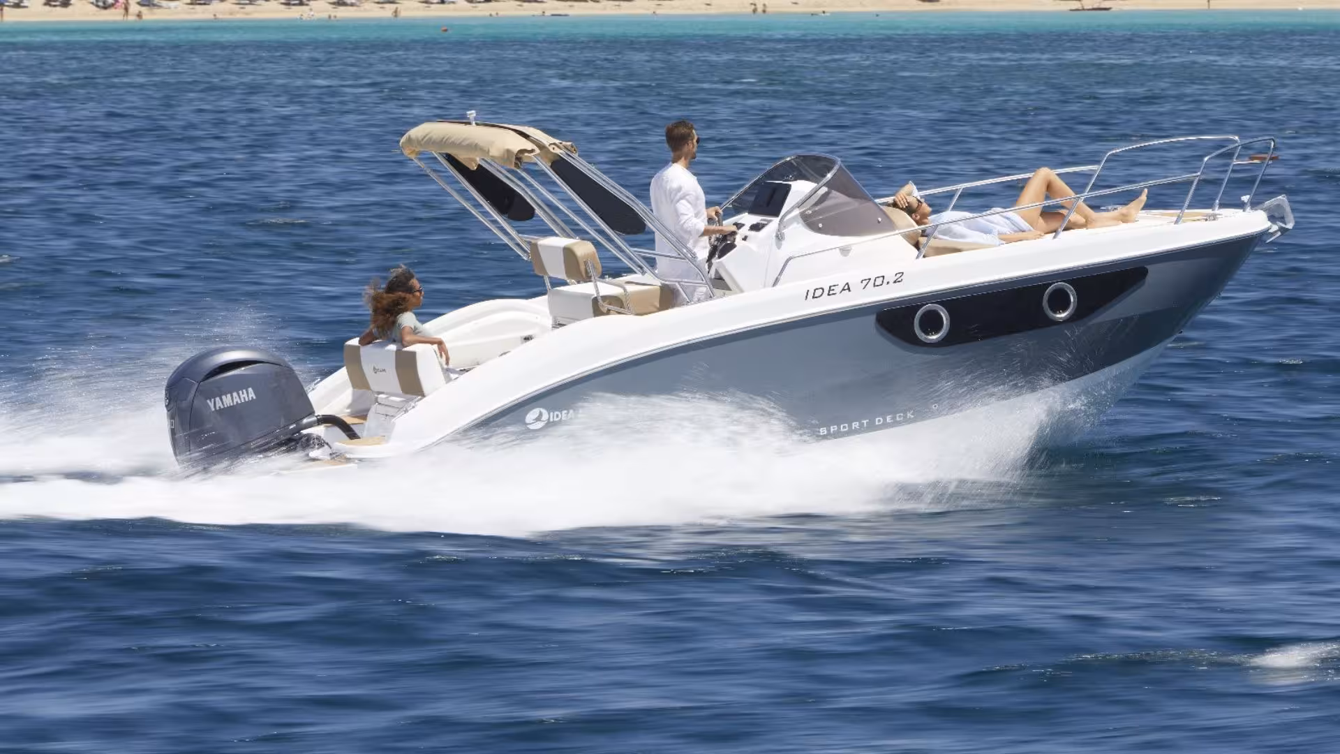 Speedboat gliding through the blue waters near Villasimius during a private sunset tour.
