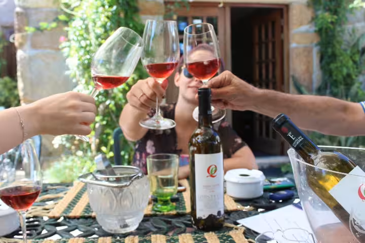 Image of celebration with a glass of green wine