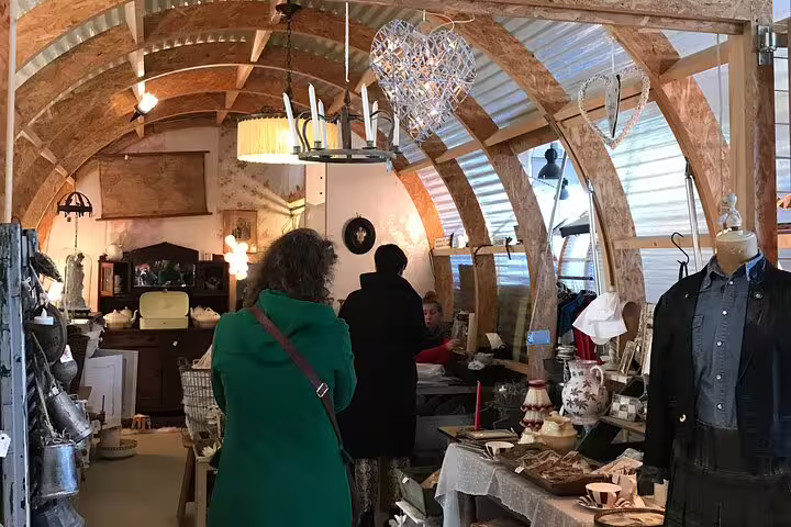 Vintage shop inside arched warehouse in Eindhoven, local design finds on Eindhoven journey to the future tour