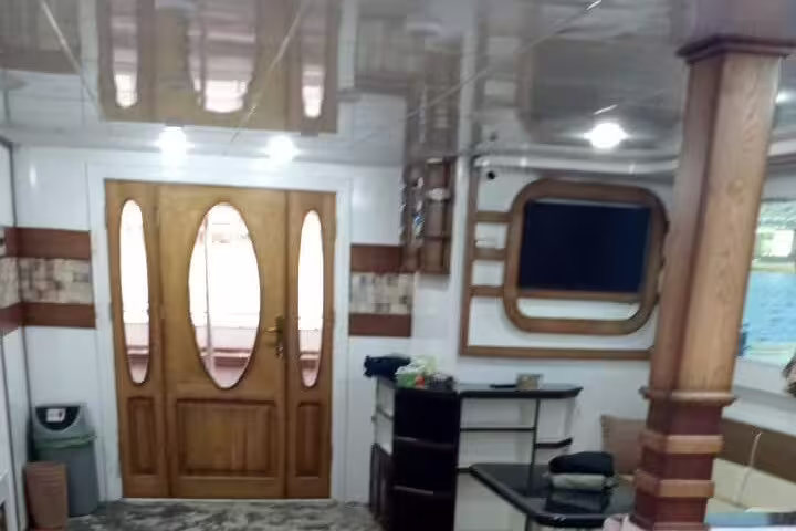 Interior of VIP boat cabin before Samadai Dolphin House snorkeling trip with dolphins from Marsa Alam