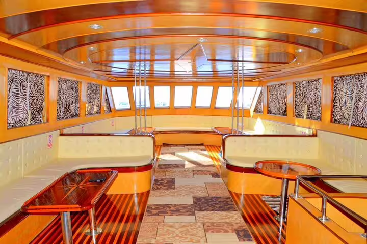 Comfortable VIP boat cabin lounge for private snorkeling day trip to White Island and Ras Mohamed, Sharm
