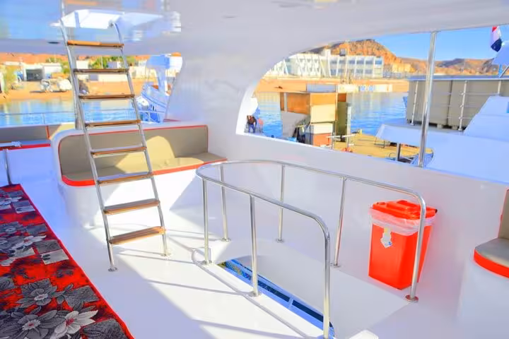 VIP boat deck seating and ladder at Sharm El Sheikh marina for Ras Mohamed and White Island snorkeling trip