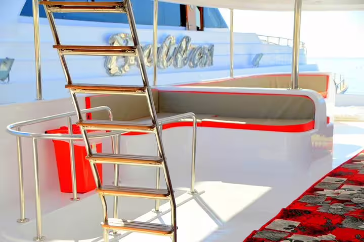Private VIP boat deck with ladder and seating, ideal for White Island and Ras Mohamed snorkeling day trip