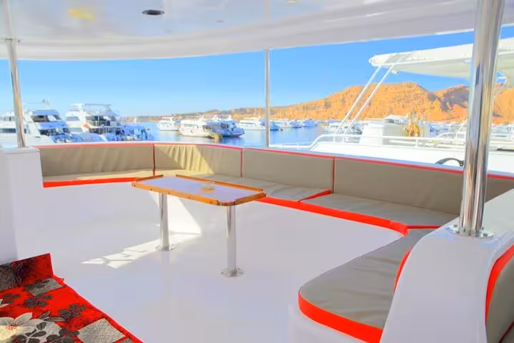 VIP boat shaded lounge with sea view, relaxing deck before Ras Mohamed and White Island snorkeling trip