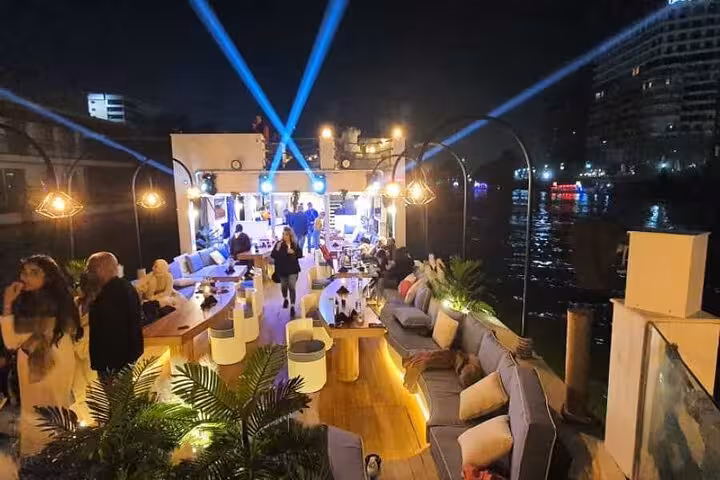 VIP Dahabiya Nile cruise sundeck at night with lounge seating, Luxor to Aswan 4 nights 5 days
