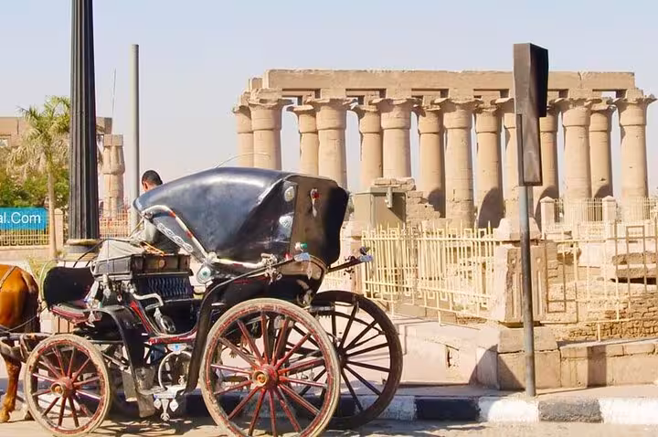 Traditional horse carriage by Karnak Temple columns, part of VIP Luxor full-day tour from Hurghada and balloon
