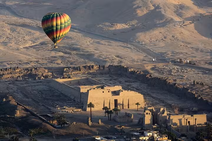 VIP Luxor hot air balloon flight over Habu Temple at sunrise with hotel pickup and drop-off included