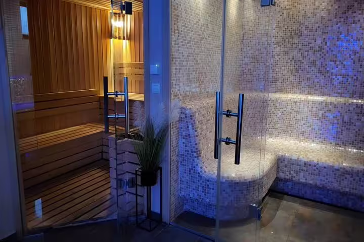 Glass steam room and wooden sauna in VIP wellness center, included in Full Body Massage from Hurghada