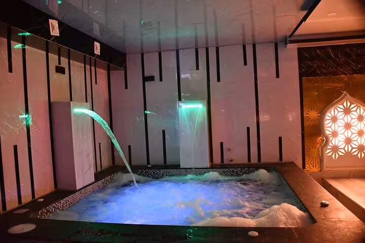 Private whirlpool pool with waterfall jets in Sharm El Sheikh, relaxing before a VIP solo massage session