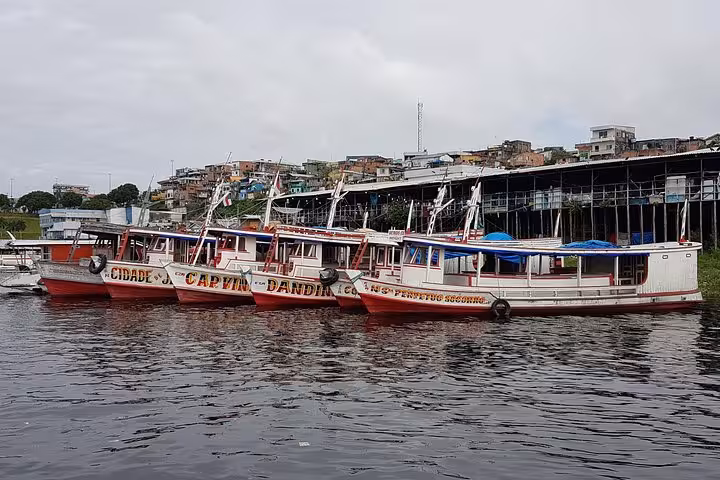 Speedboats docked at Santa Rosa river port on the Amazon route to Iquitos, Peru VIP tickets
