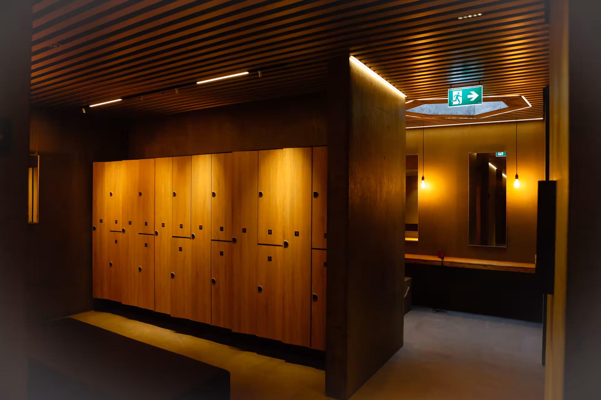 Warm wooden lockers and changing room at Vok Baths geothermal spa in Eastfjords Iceland