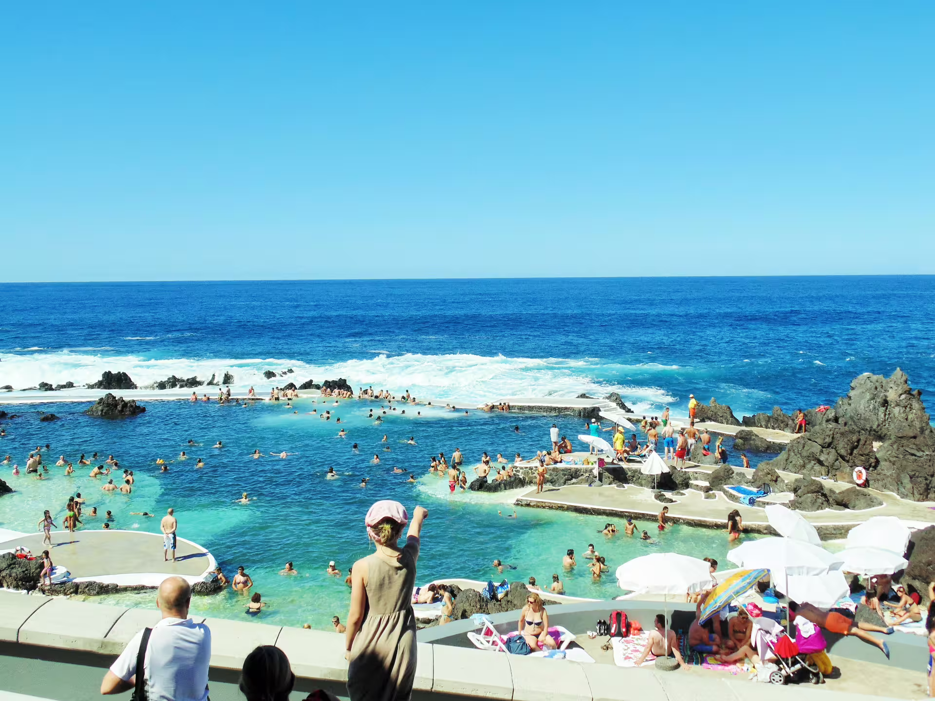 Natural volcanic swimming pools in Porto Moniz, Madeira, offering stunning ocean views and family-friendly activities.