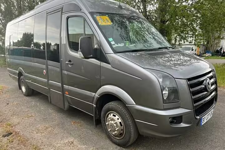 Gray Volkswagen Crafter minivan for private chauffeur transfer service