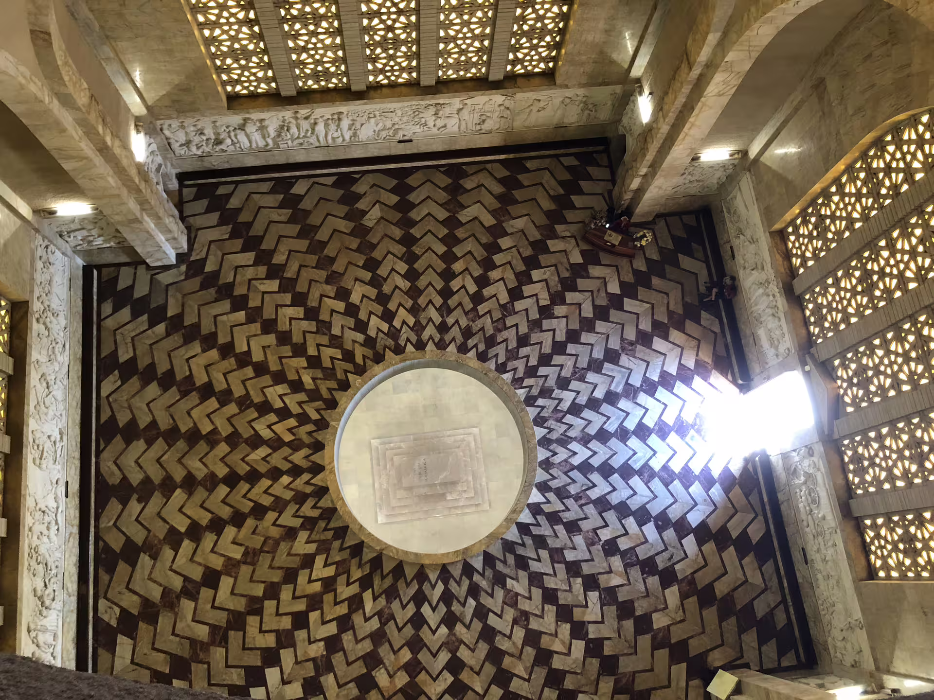 Stunning geometric floor design at the Voortrekker Monument, a highlight of the Half-Day Pretoria City Tour from Johannesburg.