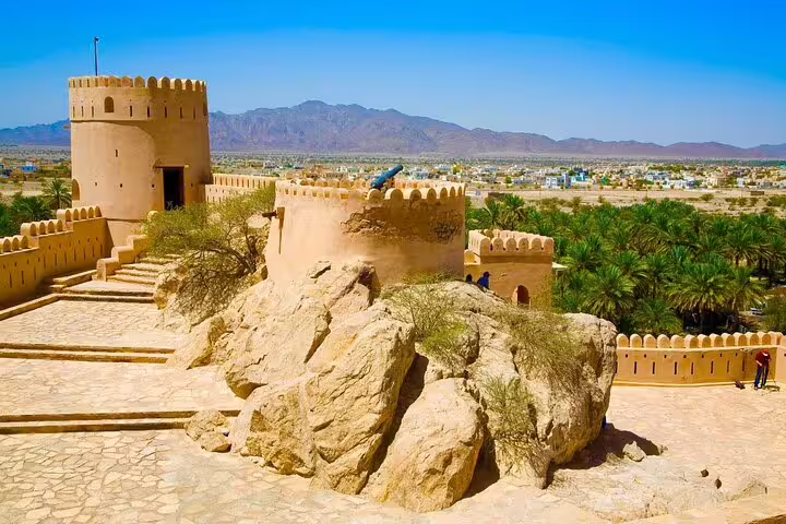 Experience panoramic views from the ancient fort on the 2 Days 1 Night Wakan Private Tour, surrounded by Oman's scenic beauty.