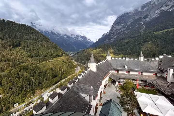 Panoramic rooftop view of Werfen Castle with alpine valley scenery on Eagles Nest and Werfen Castle tour