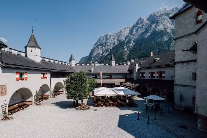 Werfen Castle courtyard in Austria with alpine backdrop on private day tour from Salzburg