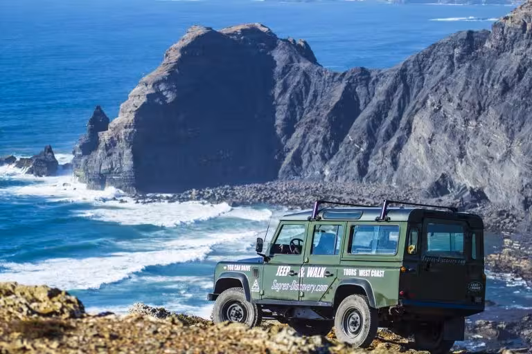 Explore the stunning cliffs of the West Coast on a thrilling half-day jeep tour, perfect for adventure seekers.