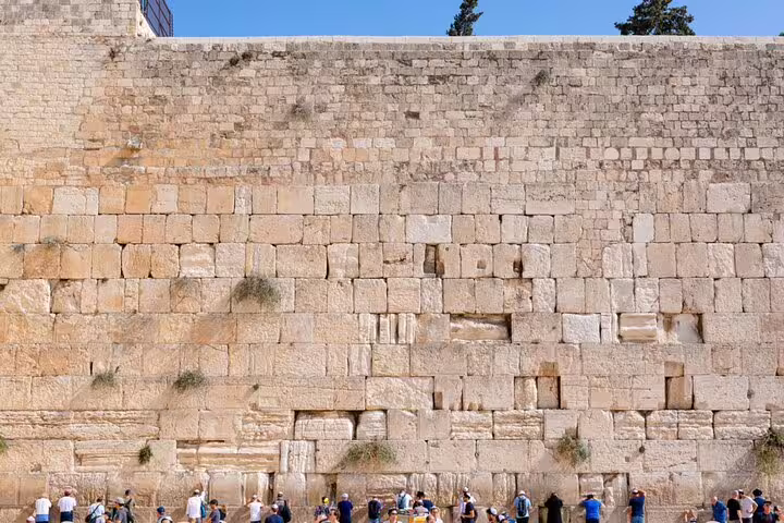 Crowds of visitors at the Western Wall, Jerusalem's ancient limestone prayer site