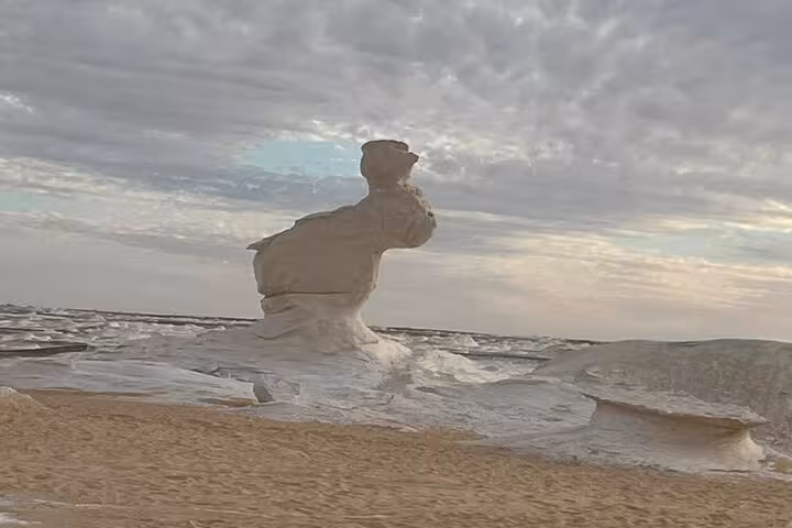 Wind-carved chalk rock formation in White Desert, Egypt, on a private two-day Black and White Desert camp trip