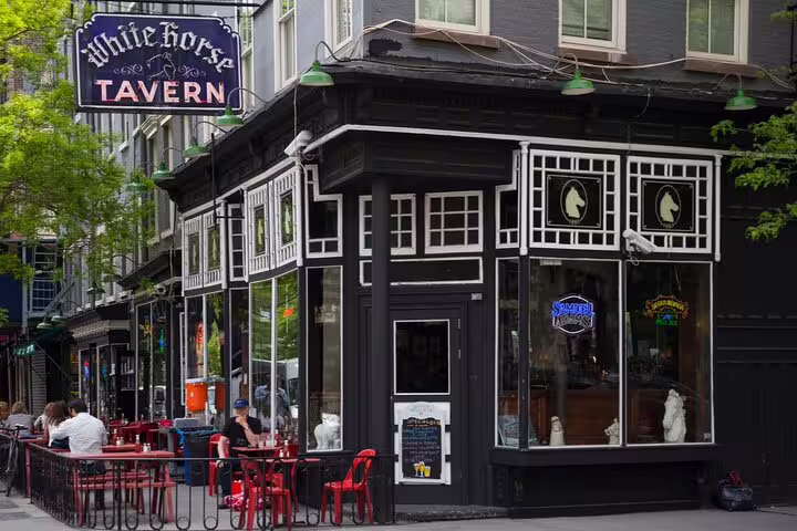 White Horse Tavern exterior with outdoor seating in Greenwich Village, NYC