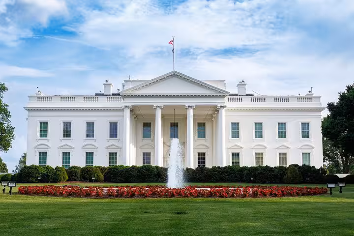 White House north facade with fountain and red flower garden, Washington DC