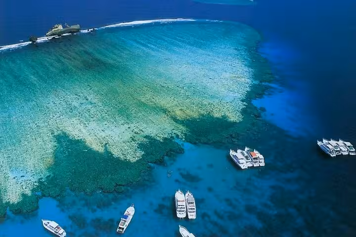 Aerial view of White Island sandbar and Ras Mohammed reef with snorkel boats, Sharm El Sheikh trip